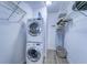 Convenient laundry closet with washer and dryer at 8911 Midnight Pass Rd # 110, Sarasota, FL 34242