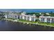 Aerial view of waterfront condos with boat slips at 8911 Midnight Pass Rd # 110, Sarasota, FL 34242