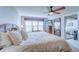 King-size bed, large closet, and access to the balcony at 8911 Midnight Pass Rd # 110, Sarasota, FL 34242