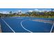 A full outdoor basketball court with two hoops and shelters offers a fun recreation opportunity for residents at 12354 Nantahala Run, Parrish, FL 34219