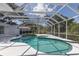 Refreshing screened pool and spa, ideal for outdoor fun at 2085 Sandhill Ln, Nokomis, FL 34275