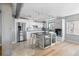 Modern kitchen with stainless steel appliances and an island at 555 S Gulfstream Ave # 804, Sarasota, FL 34236
