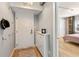 Bright condo entryway with shoe storage and coat hooks at 555 S Gulfstream Ave # 804, Sarasota, FL 34236