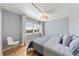 Spacious bedroom with large window and light gray walls at 555 S Gulfstream Ave # 804, Sarasota, FL 34236