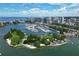 Aerial view of a marina with boats and a park at 555 S Gulfstream Ave # 804, Sarasota, FL 34236