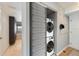 Condo laundry room with stackable washer and dryer at 555 S Gulfstream Ave # 804, Sarasota, FL 34236
