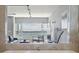 Bathroom with a large mirror reflecting a waterfront view at 555 S Gulfstream Ave # 804, Sarasota, FL 34236