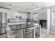 Modern white kitchen with stainless steel appliances at 555 S Gulfstream Ave # 804, Sarasota, FL 34236