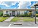 Two-unit building with modern exterior and landscaping at 6050 28Th W St # 14B, Bradenton, FL 34207