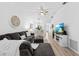 Open living space with L-shaped sofa and hardwood floors at 6050 28Th W St # 14B, Bradenton, FL 34207