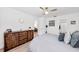 Main bedroom with dresser and large bed at 6050 28Th W St # 14B, Bradenton, FL 34207