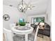 Bright dining area adjacent to living room at 6050 28Th W St # 14B, Bradenton, FL 34207