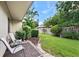 Landscaped backyard with patio and seating at 6050 28Th W St # 14B, Bradenton, FL 34207