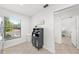 Cozy kitchen nook with a beverage station and view of bedroom at 6050 28Th W St # 14B, Bradenton, FL 34207