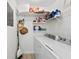 Laundry room with washer, dryer, and shelving for storage at 6050 28Th W St # 14B, Bradenton, FL 34207
