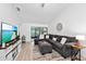 Spacious living area with comfortable seating and large TV at 6050 28Th W St # 14B, Bradenton, FL 34207