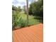 Nice deck overlooks a grassy backyard at 15427 & 15419 Lime Dr, Punta Gorda, FL 33955