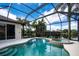 Screened pool and spa with lake view at 13814 Nighthawk Ter, Lakewood Ranch, FL 34202