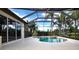 Relaxing screened pool and spa overlooking a tranquil lake at 13814 Nighthawk Ter, Lakewood Ranch, FL 34202