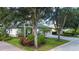 Two-story house with a two-car garage and landscaped yard at 13814 Nighthawk Ter, Lakewood Ranch, FL 34202