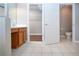 Bathroom has a double vanity and toilet at 13814 Nighthawk Ter, Lakewood Ranch, FL 34202