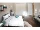 Charming bedroom with a full-size bed and built-in shelves at 13814 Nighthawk Ter, Lakewood Ranch, FL 34202