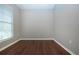 Spacious bedroom with wood flooring and window at 13814 Nighthawk Ter, Lakewood Ranch, FL 34202