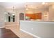 Kitchen with breakfast bar and view to dining area at 13814 Nighthawk Ter, Lakewood Ranch, FL 34202