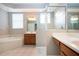 Bathroom with double vanity, soaking tub, and shower at 13814 Nighthawk Ter, Lakewood Ranch, FL 34202