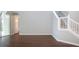 Spacious living room with hardwood floors and access to the pool at 13814 Nighthawk Ter, Lakewood Ranch, FL 34202