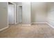 Empty bedroom with new carpet and neutral walls at 13814 Nighthawk Ter, Lakewood Ranch, FL 34202