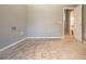 Bright bedroom with neutral walls and carpeting, and an ensuite bathroom at 13814 Nighthawk Ter, Lakewood Ranch, FL 34202