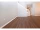 Spacious living room with hardwood floors and staircase at 13814 Nighthawk Ter, Lakewood Ranch, FL 34202