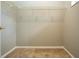 Large walk-in closet with wire shelving, providing ample storage space at 13814 Nighthawk Ter, Lakewood Ranch, FL 34202