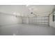 Two-car garage with epoxy flooring at 21281 Holmes Cir, Venice, FL 34293