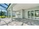 Covered patio with paver stones and access to pool area at 21281 Holmes Cir, Venice, FL 34293