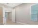 Light-filled bedroom with access to another room at 21281 Holmes Cir, Venice, FL 34293