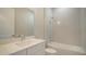 Bathroom with a tub and modern vanity at 21281 Holmes Cir, Venice, FL 34293