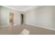 Spacious bedroom with tile floors and ample closet space at 21281 Holmes Cir, Venice, FL 34293