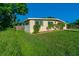 Updated home exterior showcasing landscaping and curb appeal at 2714 21St W St, Bradenton, FL 34205