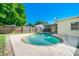 View of the kidney shaped pool from the backyard at 2714 21St W St, Bradenton, FL 34205