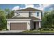 Two-story house with brown garage door at 15037 Shady Palms Ln, Nokomis, FL 34275
