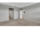Spacious bedroom with carpet flooring and access to a hallway at 12354 Nantahala Run, Parrish, FL 34219