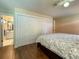 Bedroom with large closet and ensuite bathroom at 2315 Riverwood Pines Dr, Sarasota, FL 34231