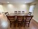 Bright dining room featuring a large table and six chairs at 2315 Riverwood Pines Dr, Sarasota, FL 34231