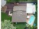 Aerial view showing house, pool, and landscaping at 2315 Riverwood Pines Dr, Sarasota, FL 34231