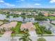 Single-Gathering home with a lake view, situated in a quiet residential neighborhood at 2995 Bravura Lake Dr, Sarasota, FL 34240