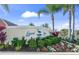 Attractive community entrance with a landscaped sign featuring the name Laurel Lakes at 2995 Bravura Lake Dr, Sarasota, FL 34240