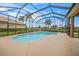Relax and enjoy the screened-in pool and lanai area at 2995 Bravura Lake Dr, Sarasota, FL 34240