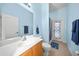 Light and bright bathroom with single sink and shower at 2995 Bravura Lake Dr, Sarasota, FL 34240